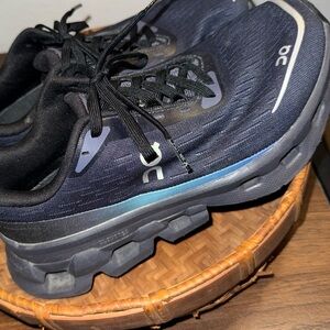 On Running woman’s Navy and Black Athletic Shoes